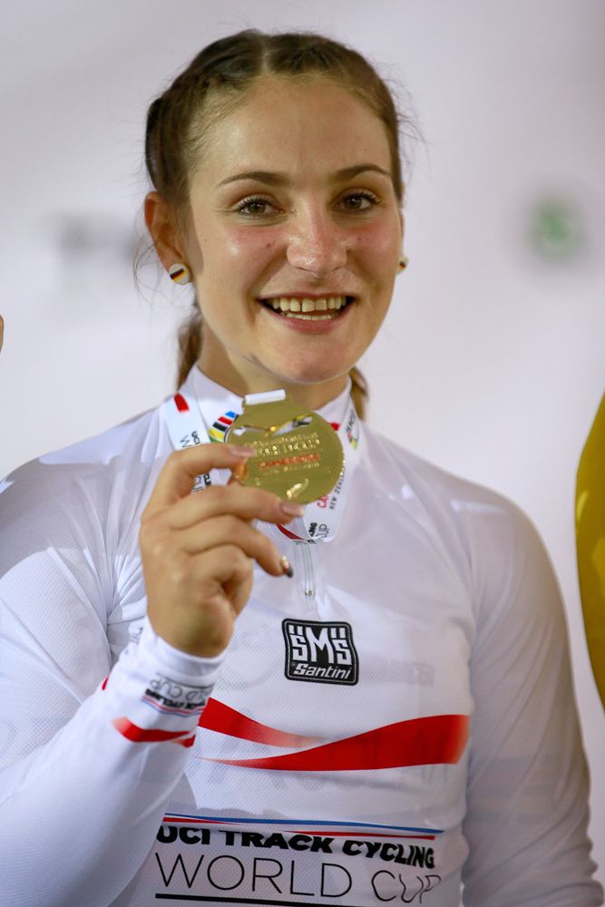 Kristina Vogel of Germany celebrates with her gold medal after winning the Womens Sprint Final against Stephanie Morton of Australia
