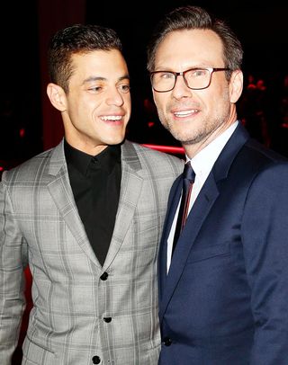 Rami Malek and Christian Slater attend the Christian Dior Menswear show as part of the Paris Fashion Week Menswear Fall/Winter 2016-2017 at Stade Pierre de Coubertin on January 23, 2016 in Paris, France.