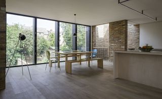 Table & chairs in large window