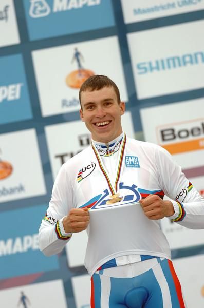 2012 U23 time trial world champion Anton Vorobyev (Russian Federation) on the podium to receive the rainbow jersey.