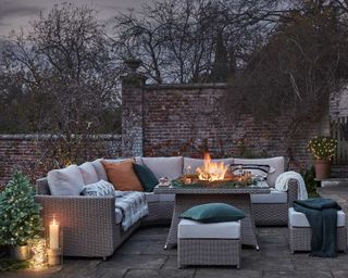 corner sofa and fire pit table from moda furnishings on winter patio