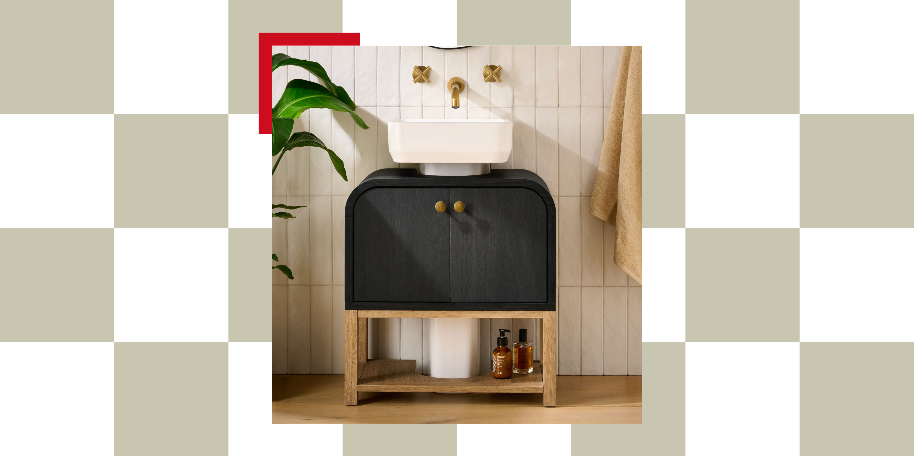 Curved, black under sink storage cabinet with gold hardware and oak legs