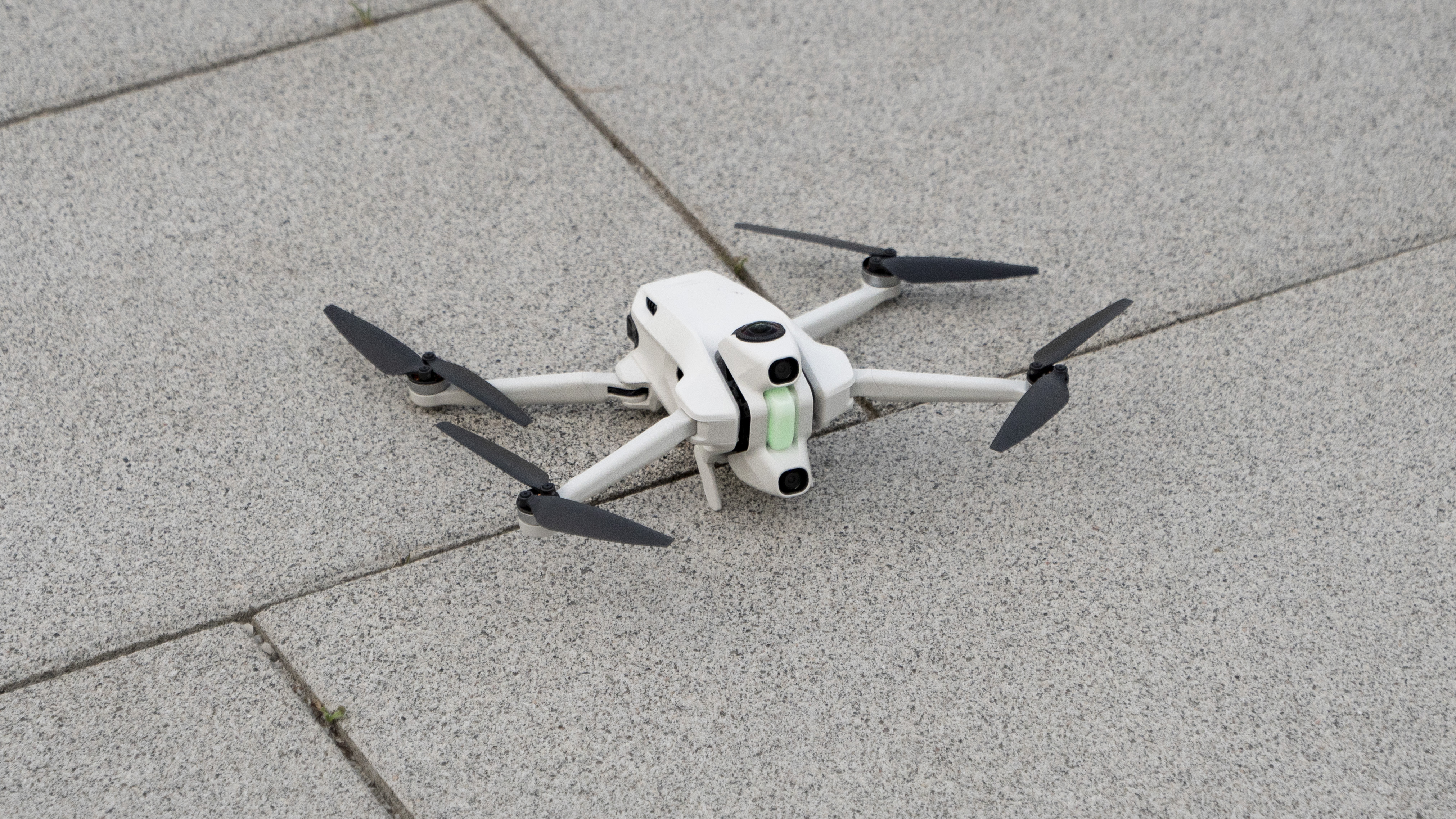Antigravity A1 drone by Insta360 on a concrete pavement