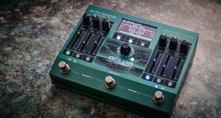 The Electro-Harmonix Oceans Abyss is described as an "Advanced Reverb Laboratory" and the green, triple-footswitch pedal has a comprehensive range of features, with sliders and dials for adjusting parameters.