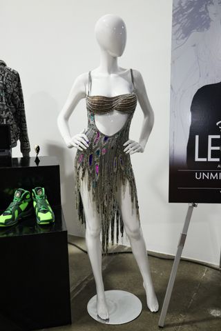 a bob mackie dress on a mannquin that Miley Cyrus wore to the 2024 grammys