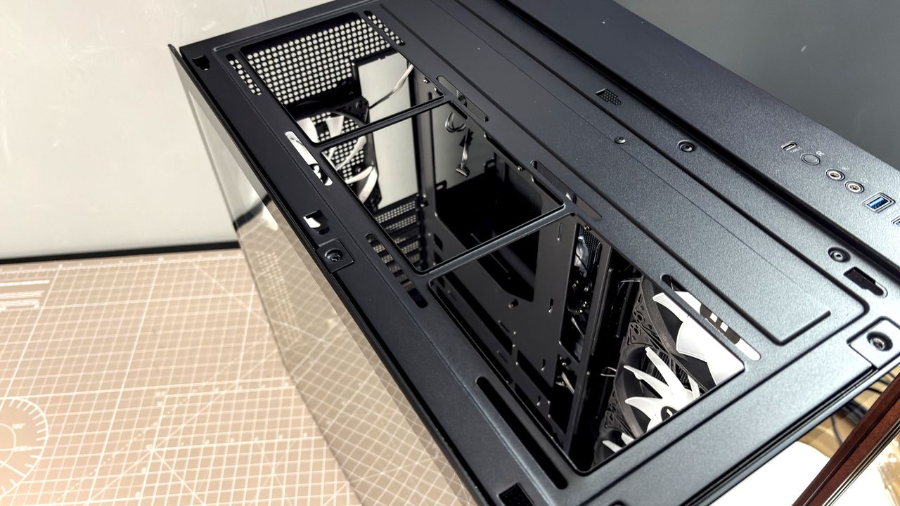 The Thermaltake View 380 WS ARGB on a desk with various components fitted.