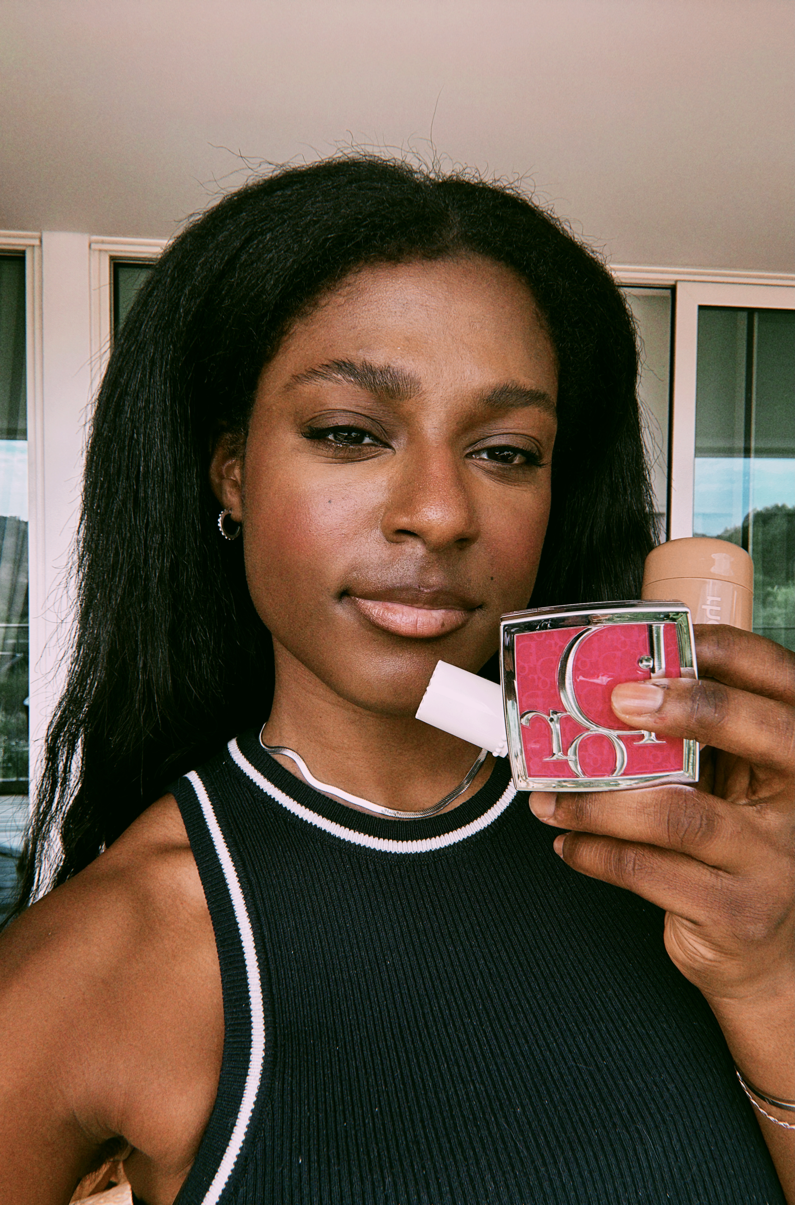Shei Mamona wearing blushes for dark skin