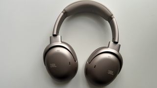 JBL Tour One M3 over-ear noise-cancelling headphones on a white surface