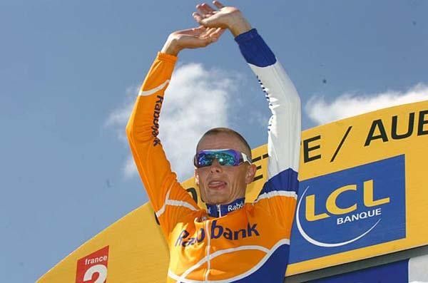 Rasmussen on the podium and celebrating his second stage win.