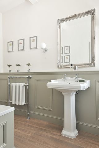 Duel fuel radiator with heated towel rail