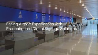 An airport alit with Nanolumens digital signage.