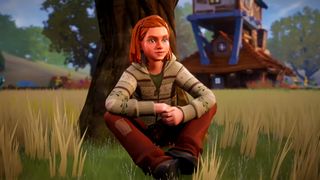 Harry Potter: Quidditch Champions screenshot showing a young girl with short red hair sitting beneath a large tree