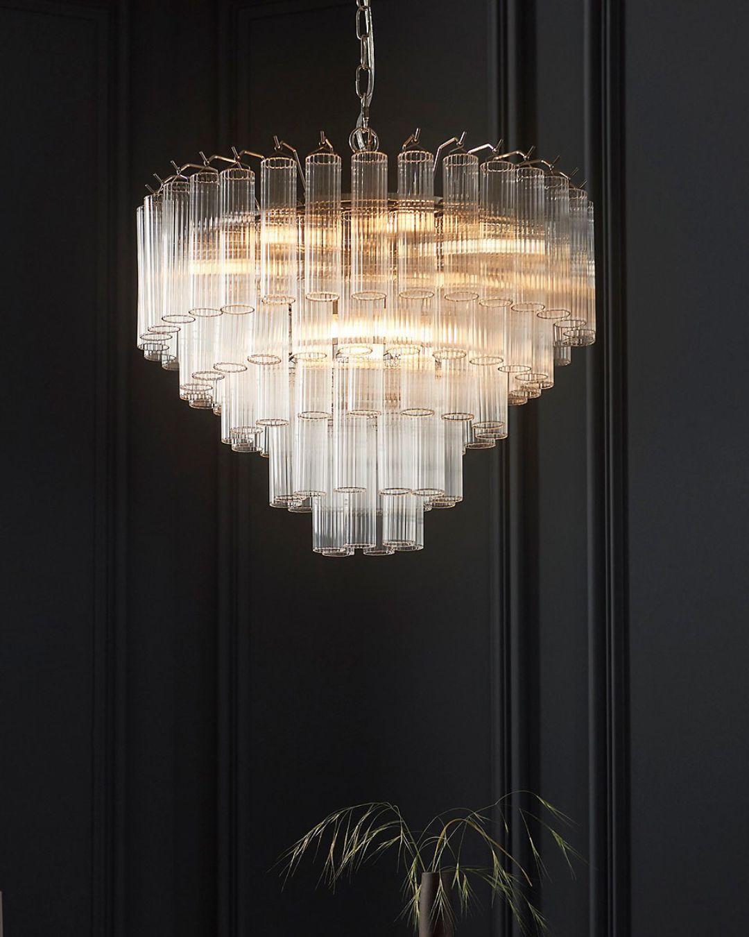 Luminosa Toulouse 12 Light Multi Arm Lamp Ceiling Pendant Bright Nickel in a black-painted living room.