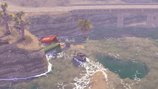 A 4x4 drives through a shallow body of water wherein two shipping containers lie opened and emptied 