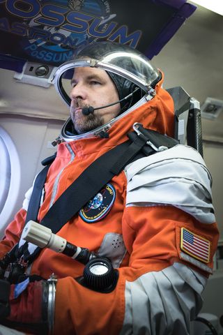 This is the third year the spacesuits have been tested on parabolic flights above Ottawa, Canada. This year, the visor was put down for the first time.