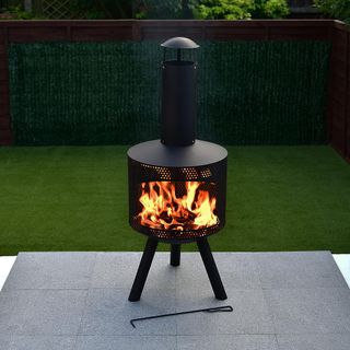black log burner with garden area