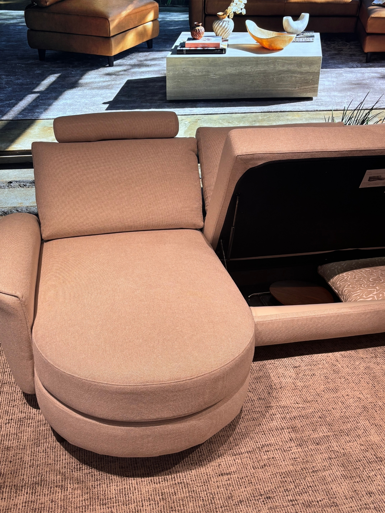a king living storage sofa in a showroom