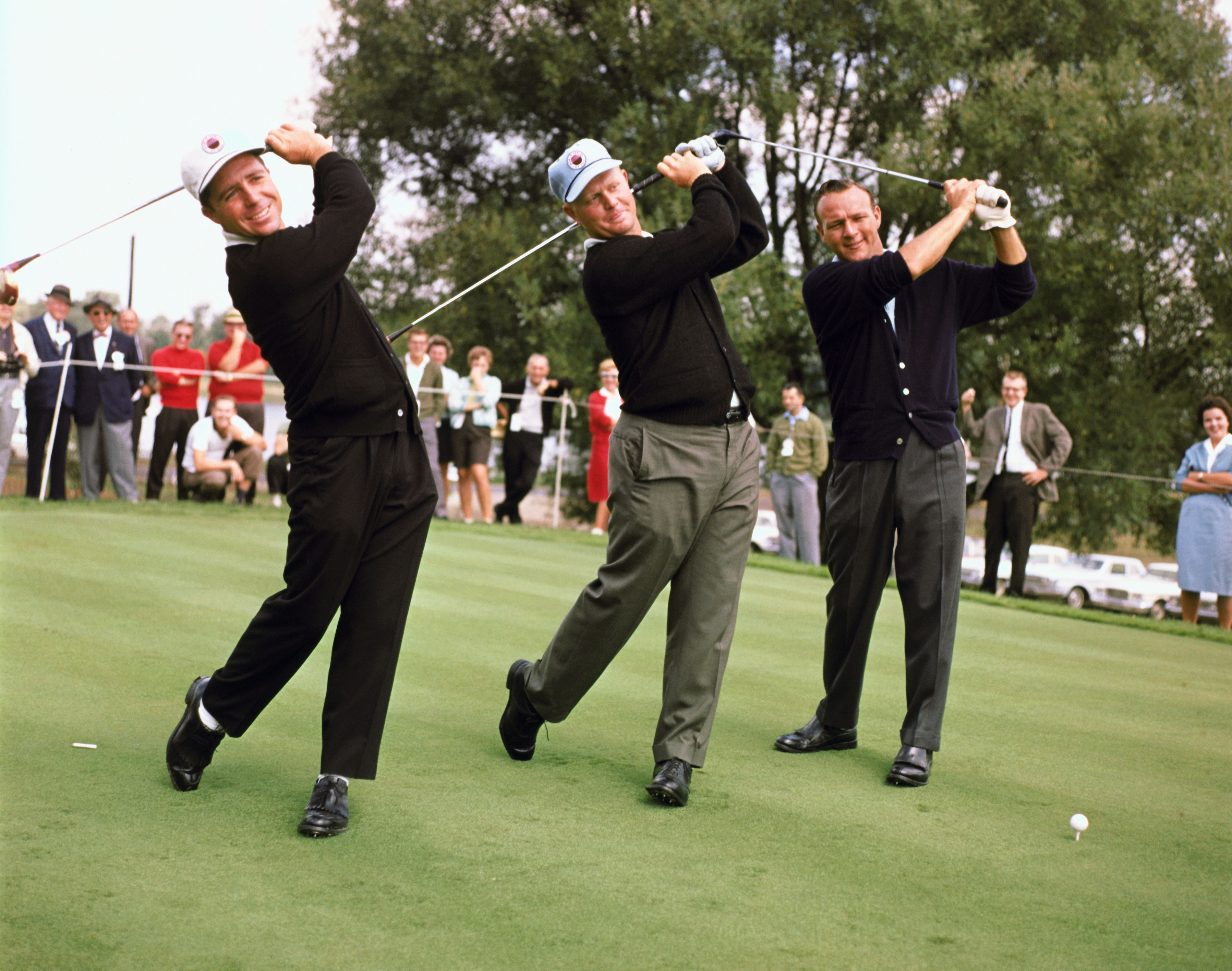 Gary Player, Jack Nicklaus and Arnold Palmer swinging