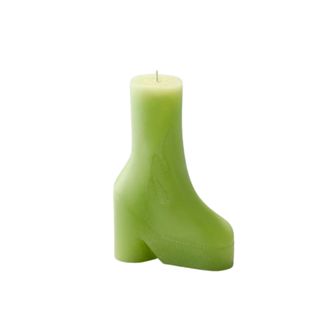 A green boot shaped candle