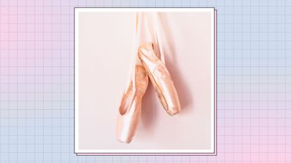 A pair of pink, satin ballet slippers hanging from their ribbon straps/ in a pink and pale blue checked template