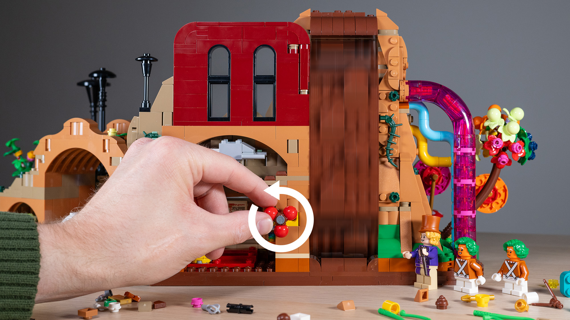 Lego Willy Wonka & the Chocolate Factory set, hand turning the chocolate waterfall mechanism