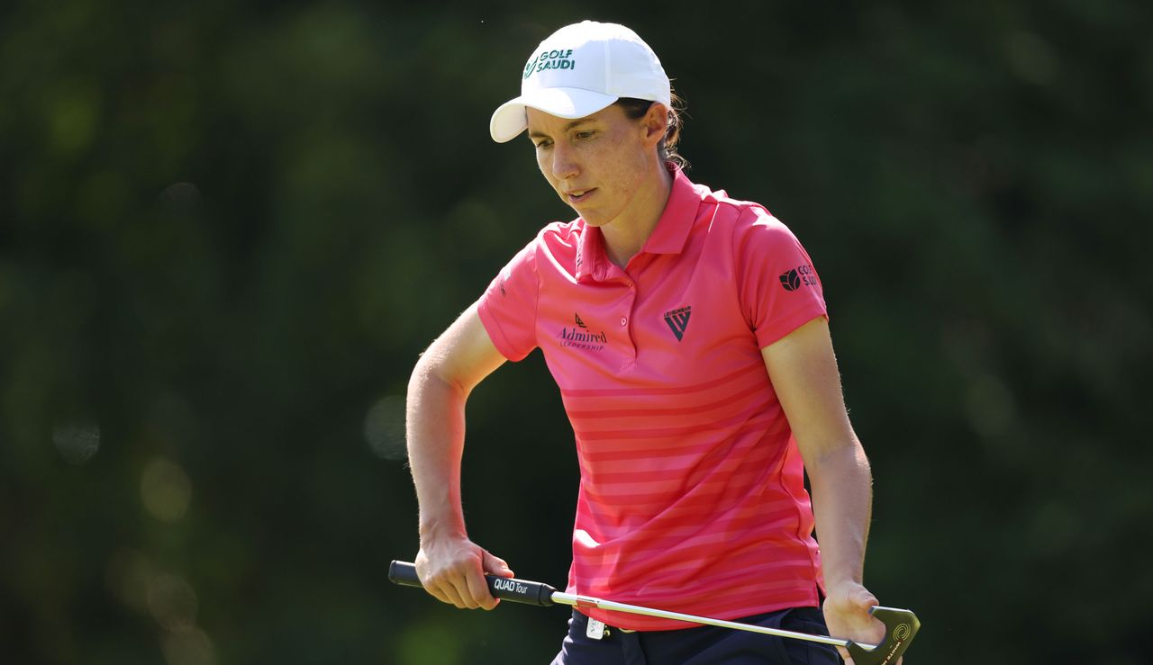 Carlota Ciganda wipes the face of her putter