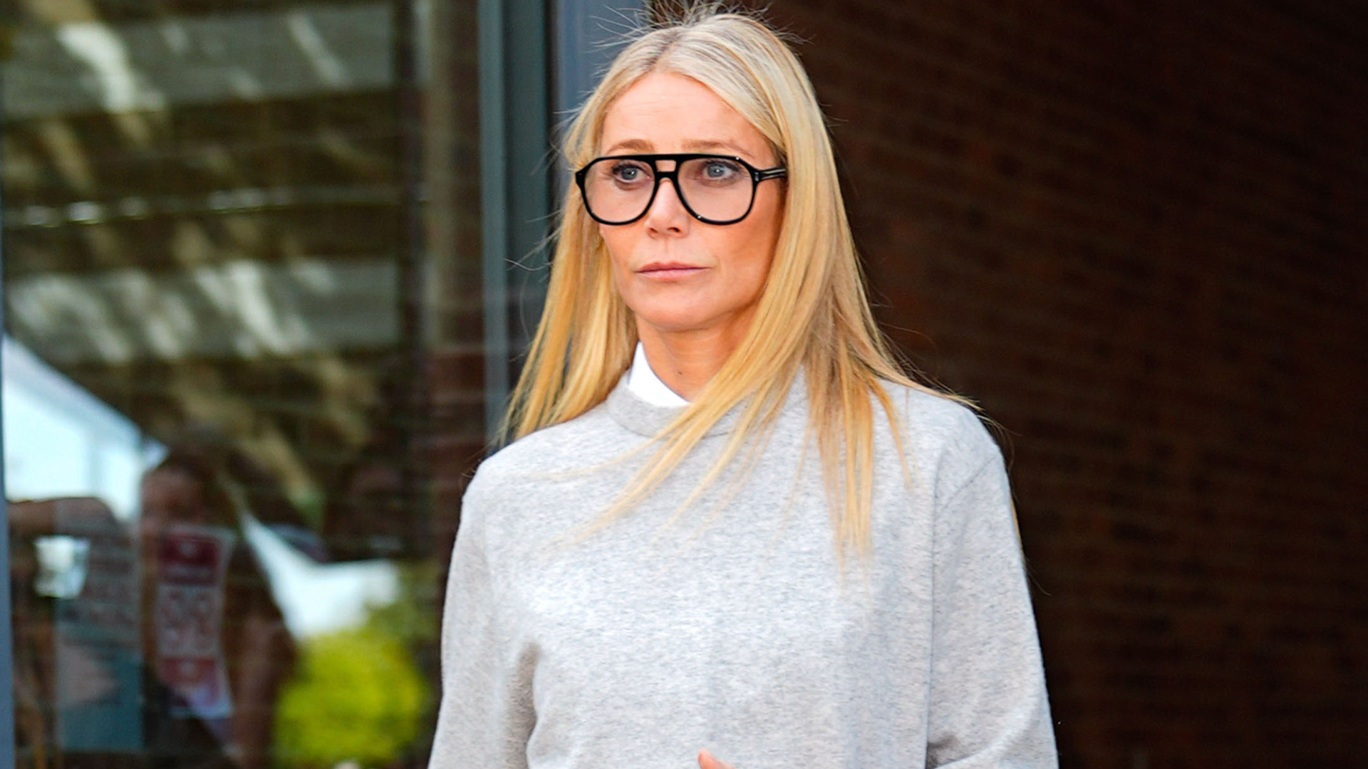 Gwyneth Paltrow arrived at Milan Fashion Week in capris, loafers, and a blue Goyard bag