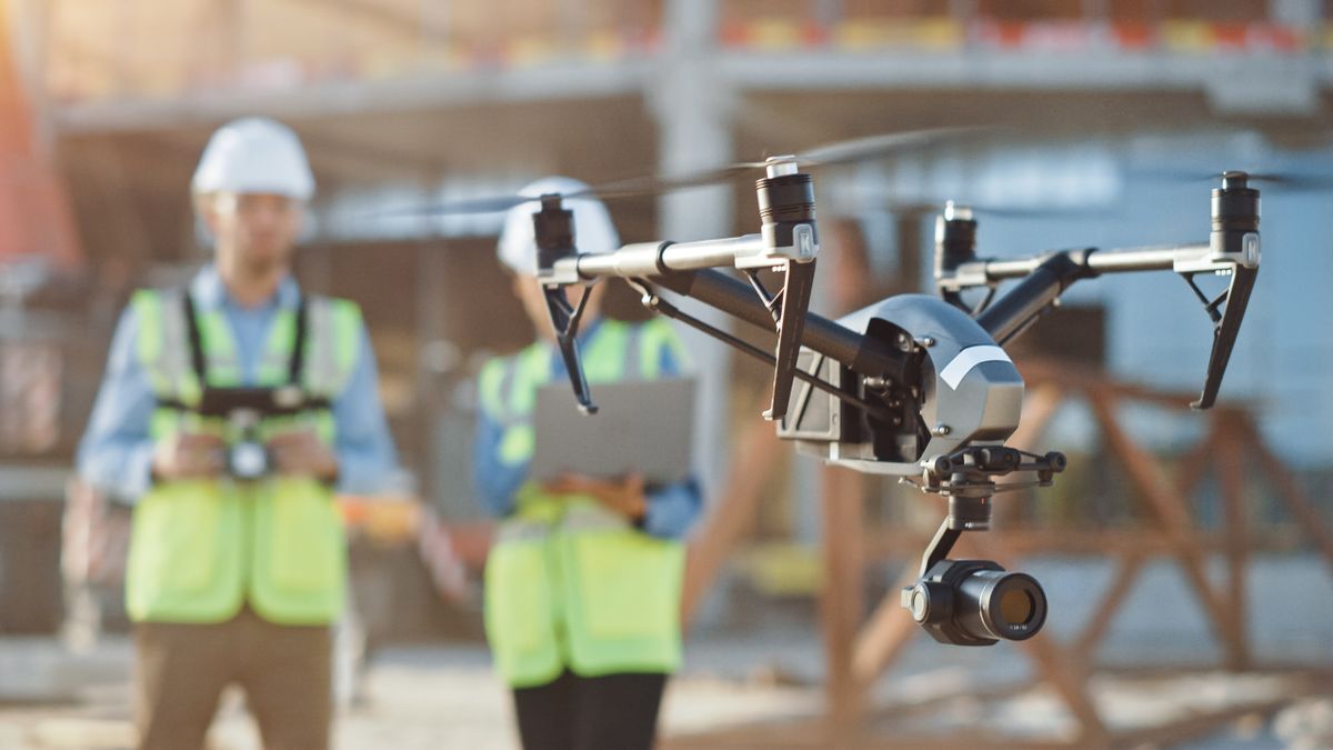 Drone being operated at a construction site