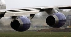 An airplane's engines emit exhaust