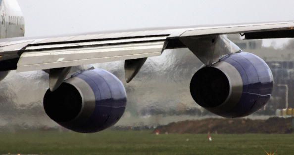 An airplane&amp;#039;s engines emit exhaust