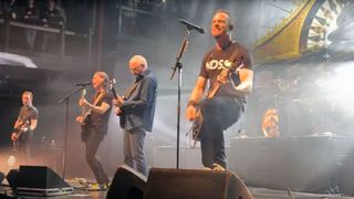 Paul Reed Smith performs onstage with Alter Bridge