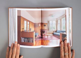 Open pages of Henry Kulka book, showing interior of Halberstam House