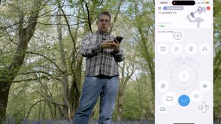 FeiyuTech Scorp 2 gimbal app sowing the user interface and an image of a man in a wooded area