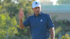 Charles Howell III salutes the crowd after holing a putt