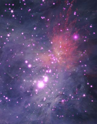 pink and purple hazy areas of space, spotted with many glowing dots.