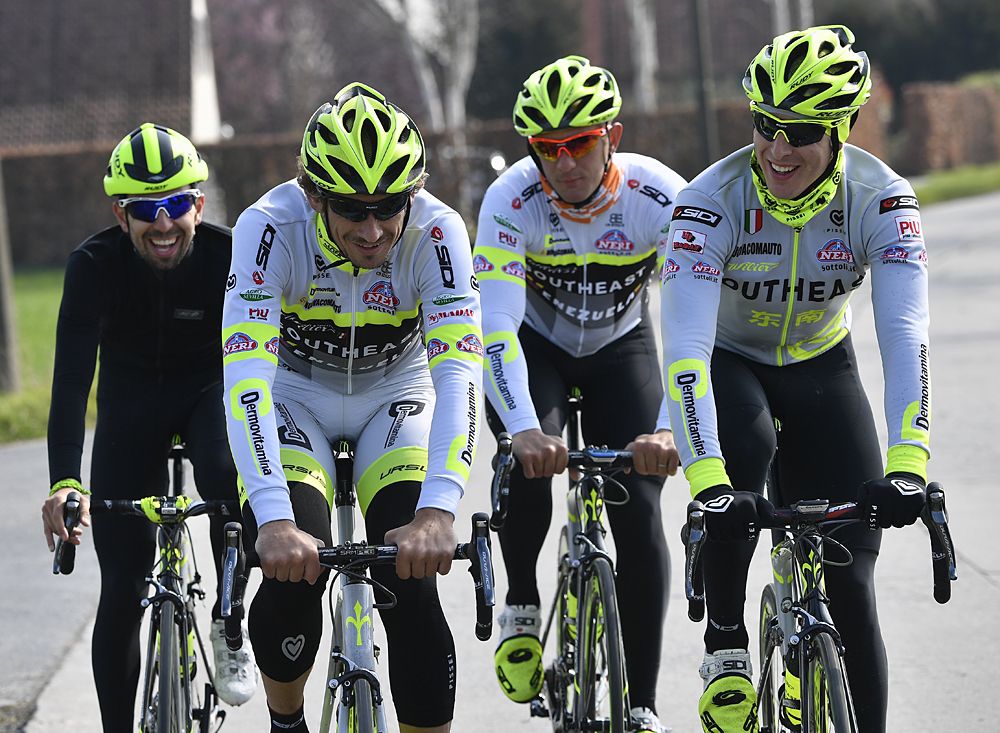 Italian Filippo Pozzato of Southeast-Venezuela (2L) practices with teammates during a track reconnaissance, on April 1, 2016, ahead of the Tour of Flanders