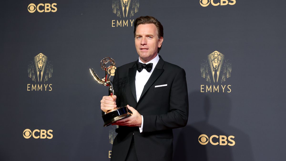 Ewan McGregor poses with his Emmy for Halston on September 19, 2021