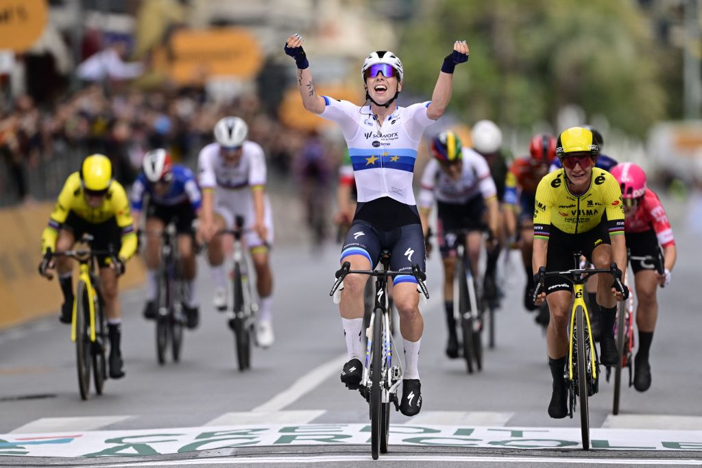 Dutch Lorena Wiebes of SD Worx-Protime (C) celebrates as she crosses the finish line, before Dutch Marianne Vos of Team Visma-Lease a Bike (R), to win the sprint at the finish of the 'Milano-Sanremo Donne' one day cycling race for women, 156km from Milan to Sanremo, Italy, Saturday 22 March 2025.BELGA PHOTO DIRK WAEM (Photo by DIRK WAEM / BELGA MAG / Belga via AFP)