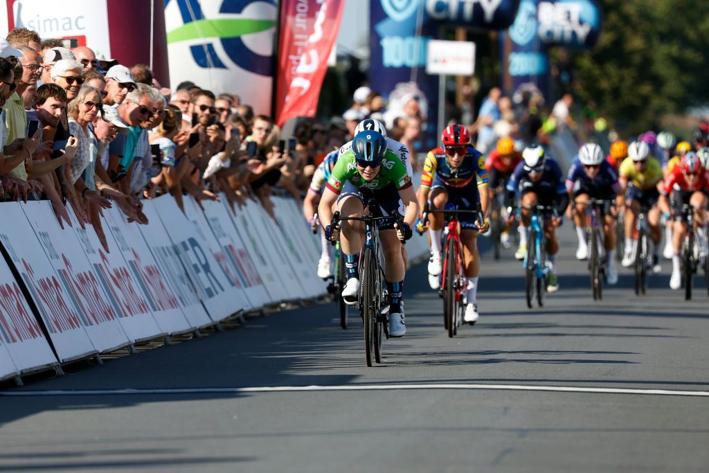 LELYSTAD NETHERLANDS SEPTEMBER 08 Stage winner Charlotte Kool of The Netherlands and Team DsmFirmenich Green Points Jersey sprints at finish line during the 25th Simac Ladies Tour 2023 Stage 3 a 1489km stage from Emmeloord to Lelystad UCIWWT on September 08 2023 in Lelystad Netherlands Photo by Bas CzerwinskiGetty Images