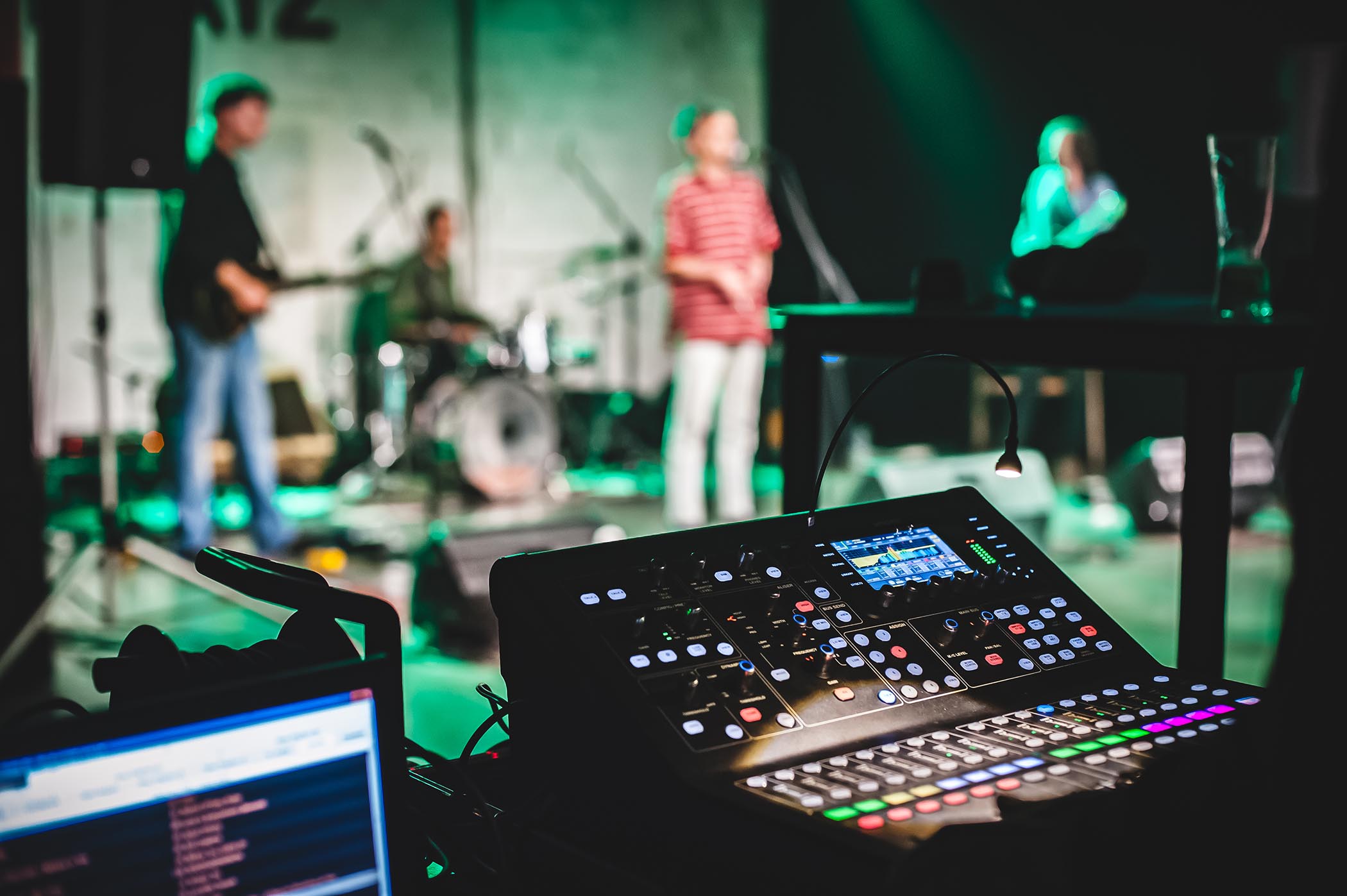 The view from the mixing desk at a small venue as a band soundcheck.