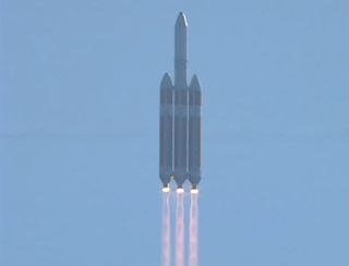 A ULA Delta 4 Heavy Rocket launches a spy satellite July 29