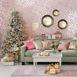 Living room with vintage glamour using soft pink and pale green on Christmas theme.