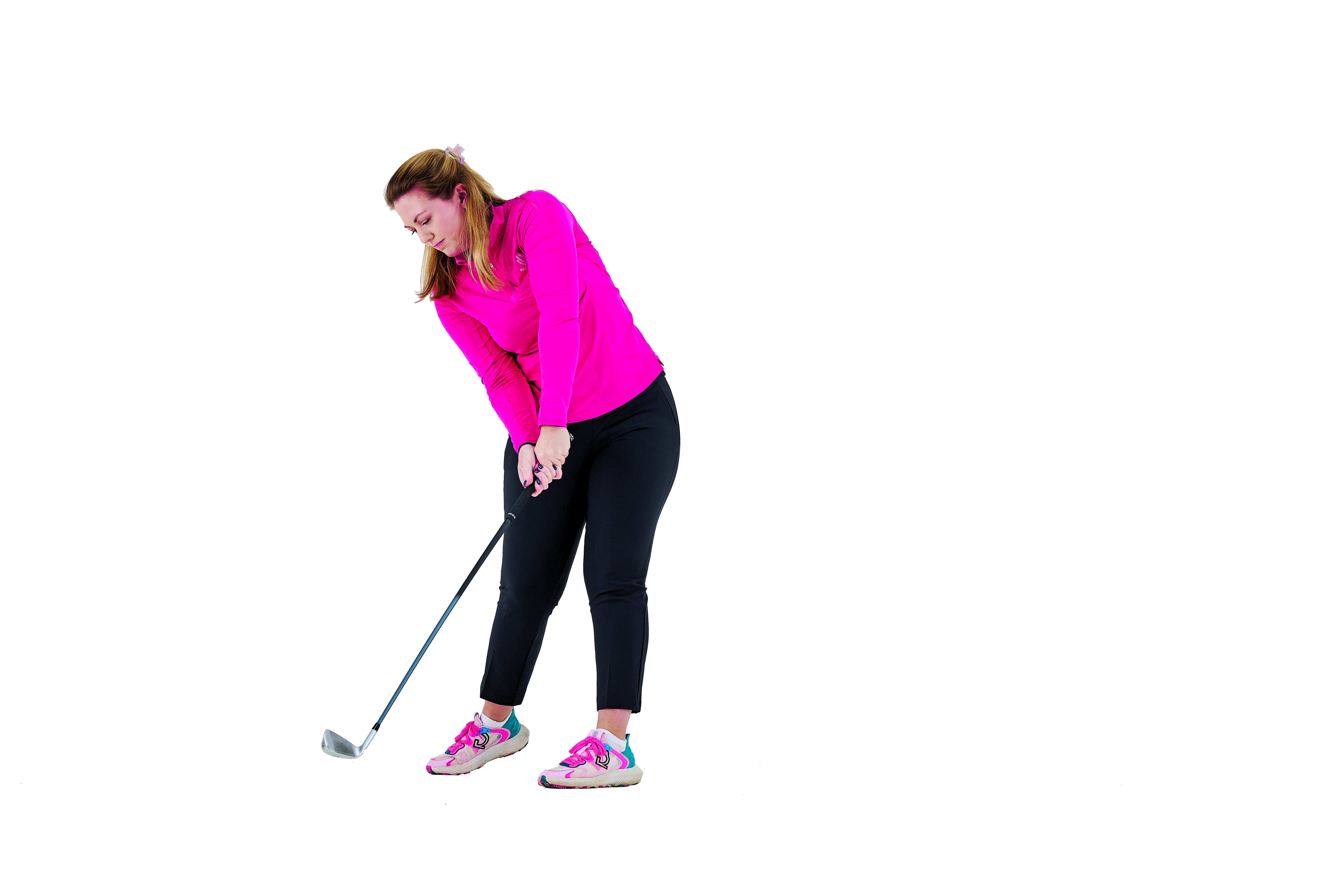 Golf Monthly Top 50 Coach Jo Taylor demonstrating the golf swing with an iron