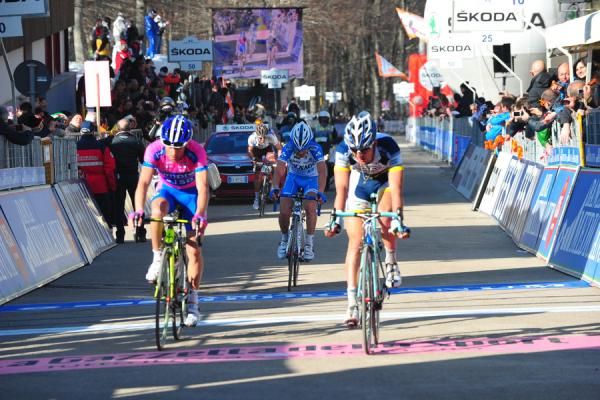 Johnny Hoogerland (Vacansoleil-DCM), Michele Scarponi (Lampre-ISD) and Domenico Pozzovivo (Colnago CSF) roll over the finish line exhausted.