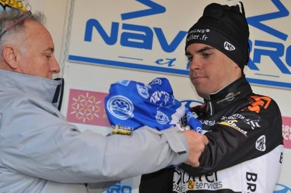 Johan Le Bon (Bretagne - Schuller) dons the mountains jersey.