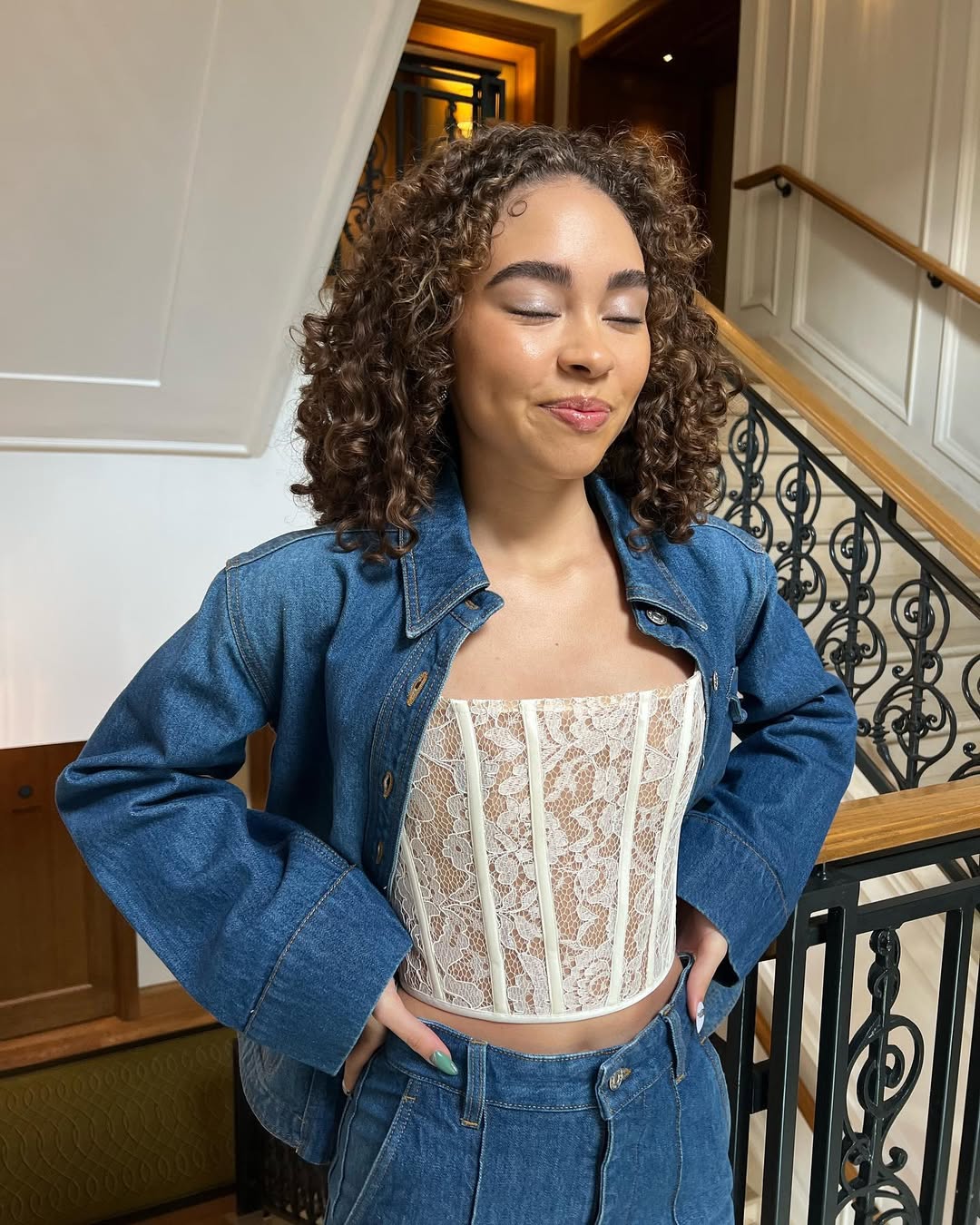 Bailey Bass with a curly bob while wearing Victoria Beckham during London Press for "Avatar: The Way of Water"