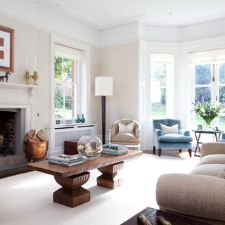 living room with white wall and coffee table