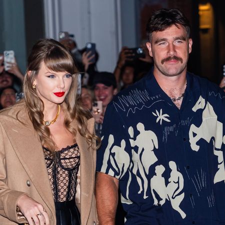 Taylor Swift holds hands with Travis Kelce