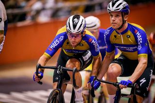 Mark Cavendish and Iljo Keisse make a change during the Ghent Six 