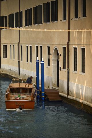 Boat at side entrance of Ca’ di Dio hotel in Venice